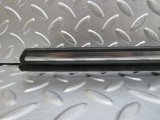 W123 front right door lower moulding trim used OEM
