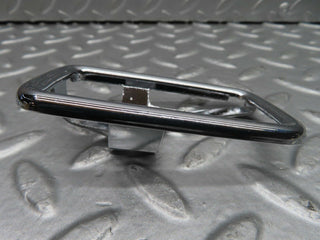 W123 chrome frame for door opener right used OEM
