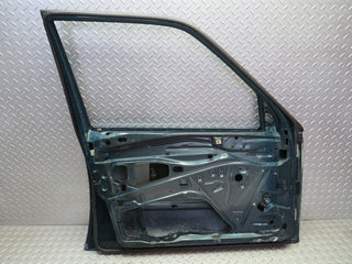 W124 Wagon front left door used OEM
