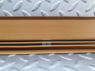 W124 rear left door sill trim palomino used OEM