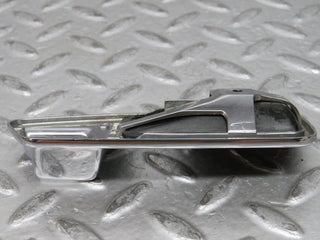 W123 chrome frame for door opener left used OEM