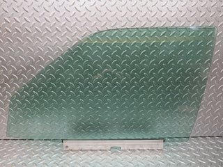 W124 Wagon front left door window glass used OEM