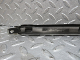 R129 SL left headlight lower trim used OEM