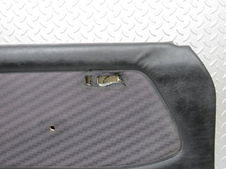 W123 front left door card black used OEM