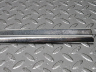 R107 SLC rear left window chrome used OEM