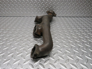 W123 exhaust manifold used OEM