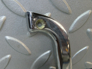 W115 left interior chrome door latch trim used OEM