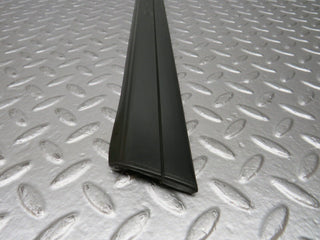 W201 Baby Benz rear left door lower moulding trim used OEM