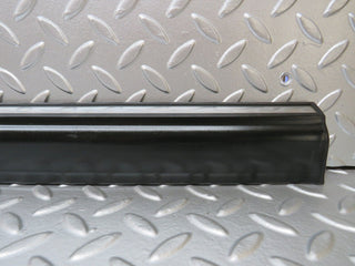 W123 front left door lower moulding trim used OEM