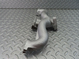 W115 exhaust manifold used OEM
