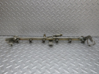 W124 Cabriolet fuel injector rail used OEM