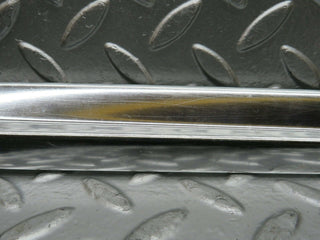 R107 SLC rear left window chrome trim used OEM