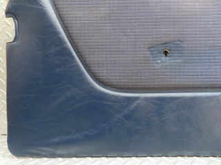 W123 Coupe front left door card blue used OEM
