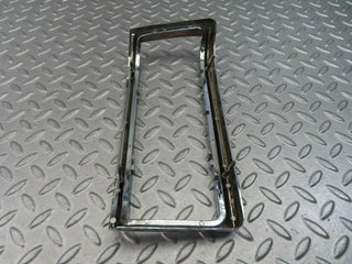 W115 tail light chrome frame left used OEM