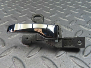 W123 left interior door handle used OEM