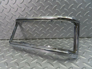 W115 tail light chrome frame right used OEM