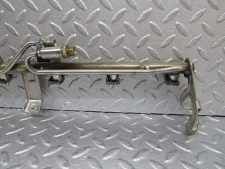 W124 Cabriolet fuel injector rail used OEM