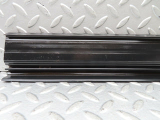 W123 rear right door sill trim black used OEM