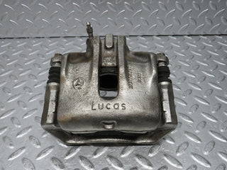 W124 Wagon front left brake caliper used OEM