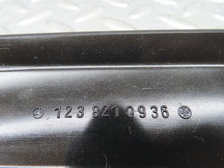 W123 cable channel cover front left used OEM