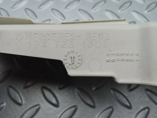W124 lock cover front left used OEM