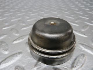 W123 wheel hub locking cap used OEM