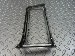 W115 tail light chrome frame left used OEM