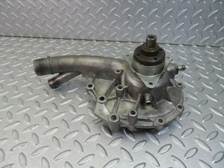 W124 water pump used OEM