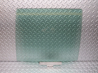 W124 Wagon rear left door window glass used OEM