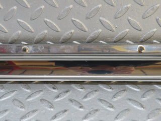 W109 front left door sill chrome used OEM