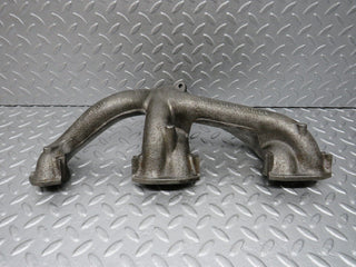 W123 exhaust manifold used OEM