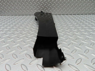 W124 front left wiring cover used OEM