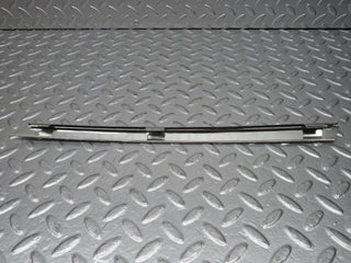 R107 SLC rear left window chrome used OEM