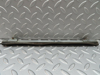 W108 front left door glass holder used OEM
