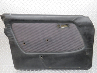 W123 front left door card black used OEM