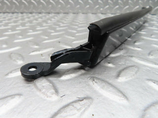 W140 headlight lower trim left side used OEM