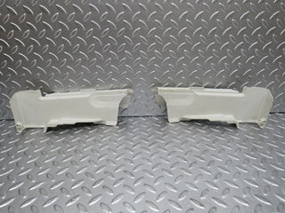 W124 front door lock cover pair used OEM