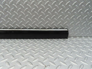 W123 front left door lower trim used OEM