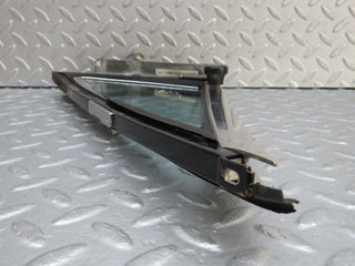 W109 front left quarter window glass used OEM