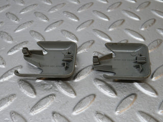 W124 Wagon front seat rail trim cover pair used OEM