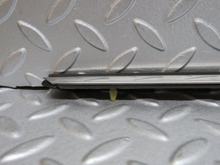 W109 front left fender wing centre moulding trim used OEM