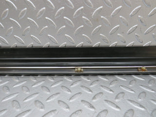 W123 front left door lower moulding trim used OEM