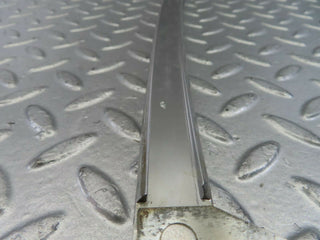W123 rear left chrome window channel used OEM
