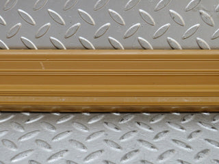 W123 rear right door sill trim palomino used OEM