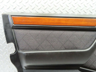 W124 Wagon front left door card black used OEM