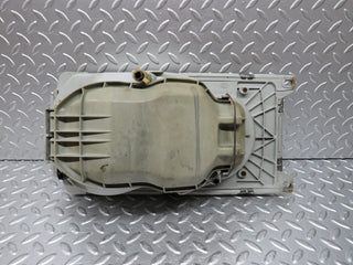 W123 headlight left side used OEM