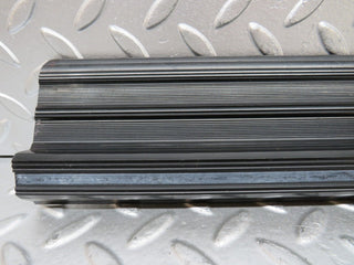 W123 front left door sill trim black used OEM