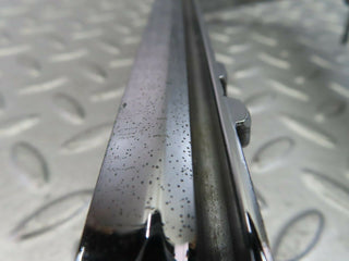 W115 tail light chrome frame left used OEM