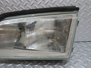 W202 headlight left side used OEM
