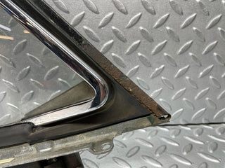 W108 front left quarter window used OEM